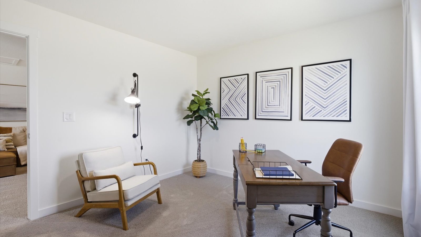 second bedroom staged as an office