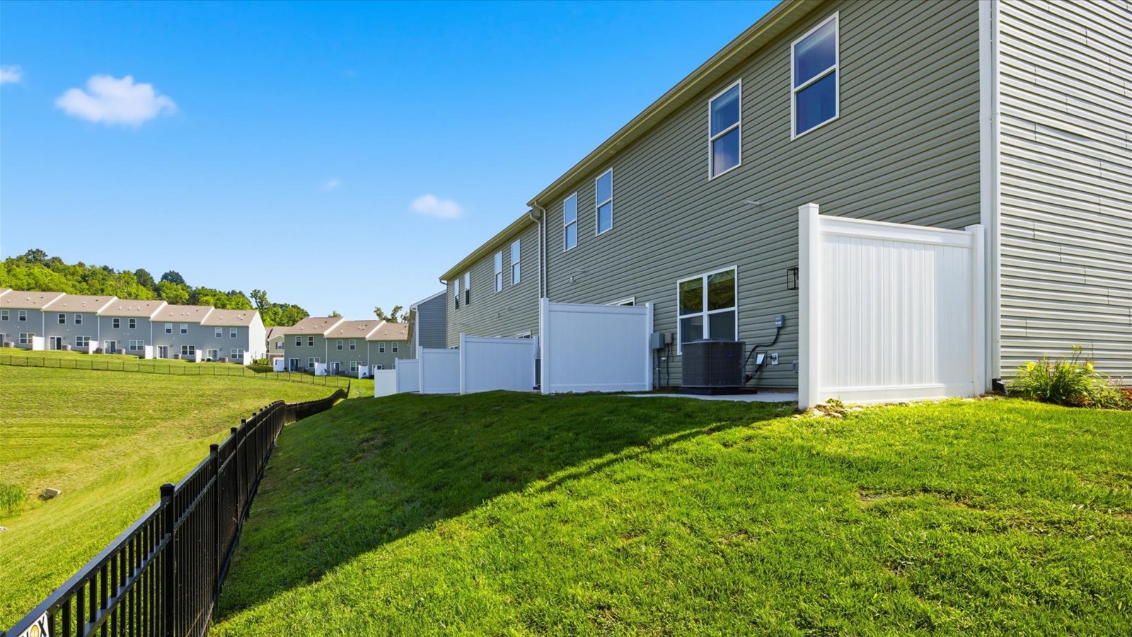 rear exterior of townhomes