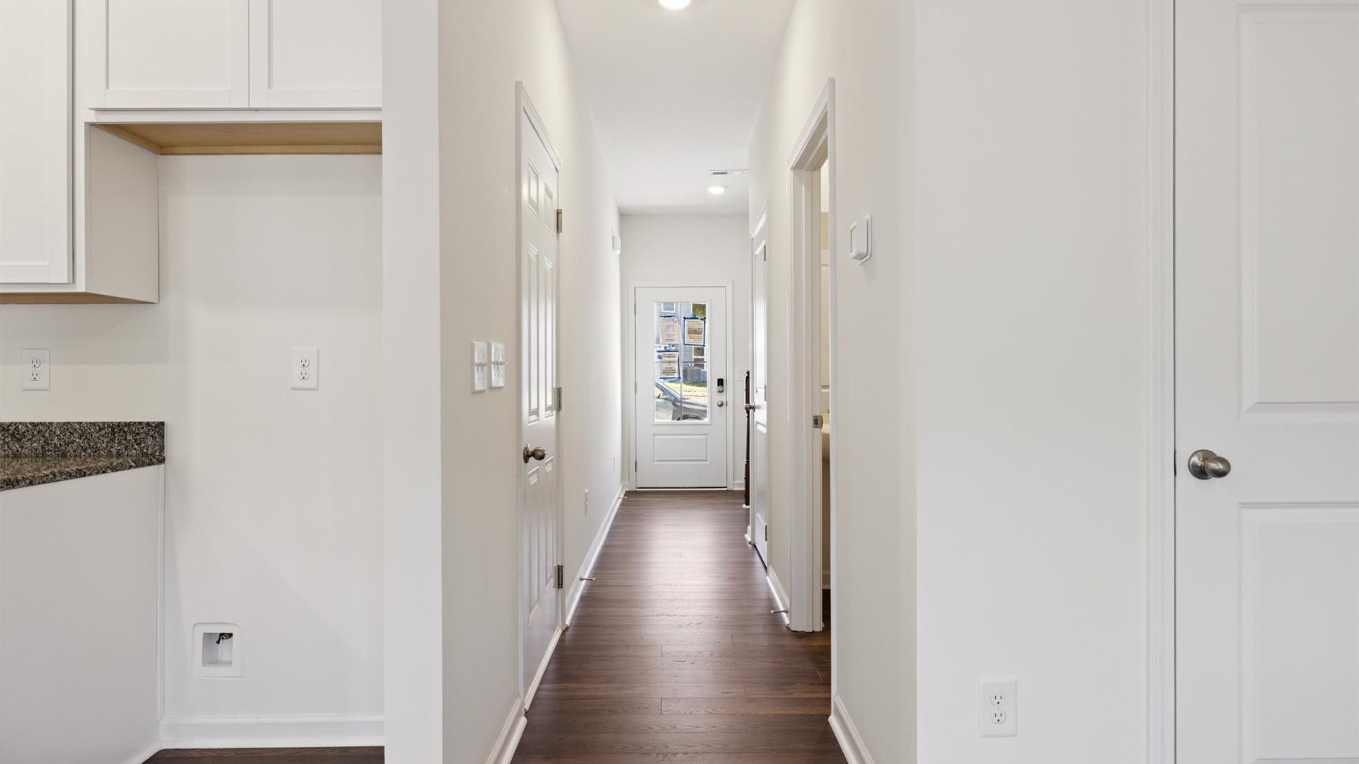 A foyer, entry hall inside front door, next to office, or sitting room adding a welcoming front, direct line of sight to home