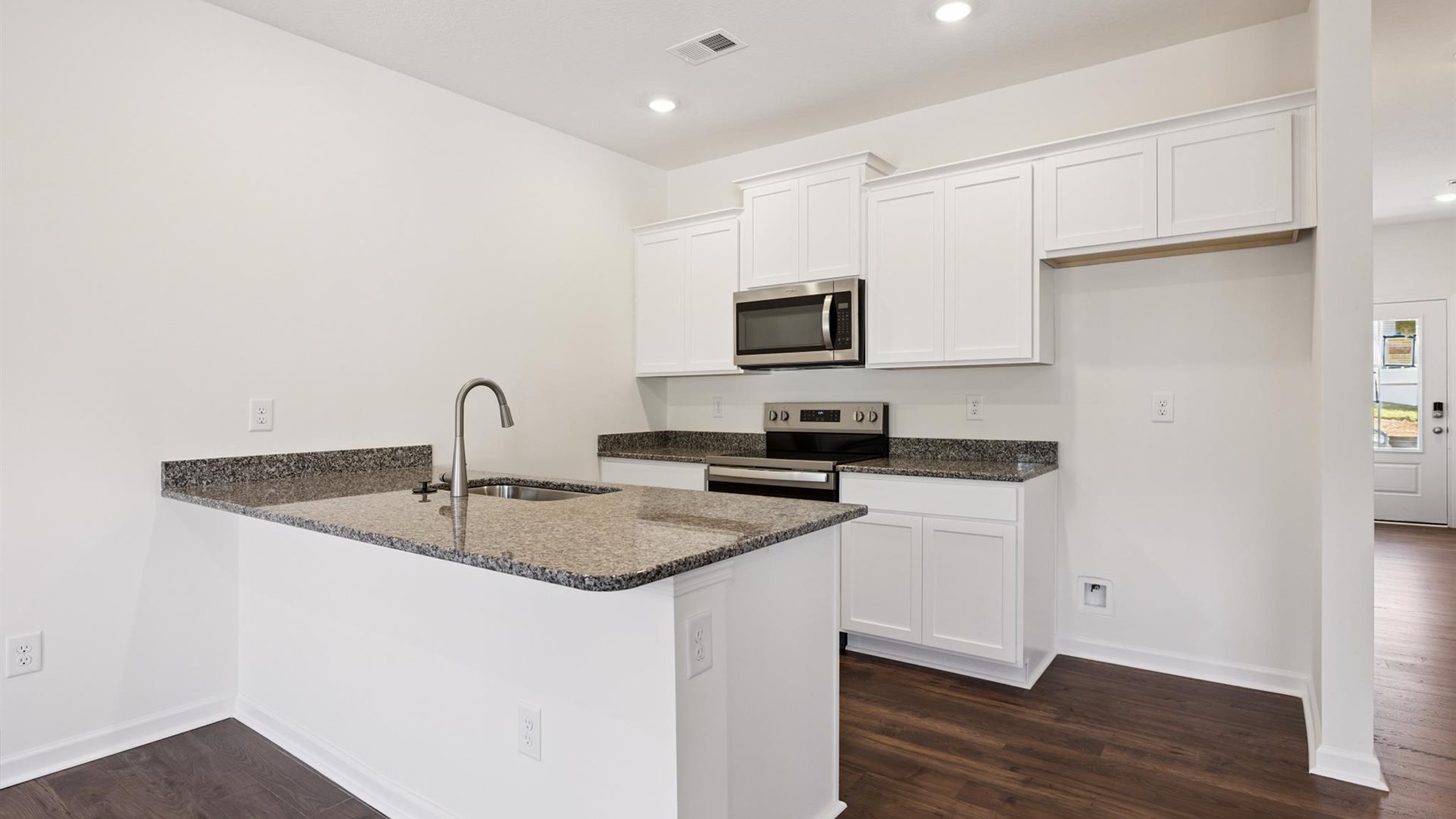 Central kitchen with sink, seating, crafted to anchor the home, pantry, prep zones, perfect for entertaining and everyday gathering