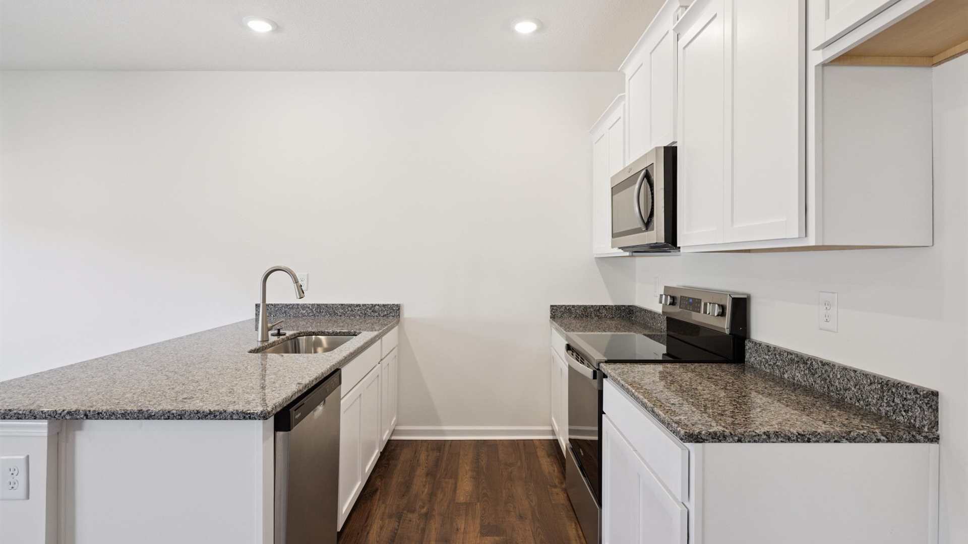 New appliance suite included, our larger kitchen island with seating anchor the kitchen, next to dining, great rooms, pantry