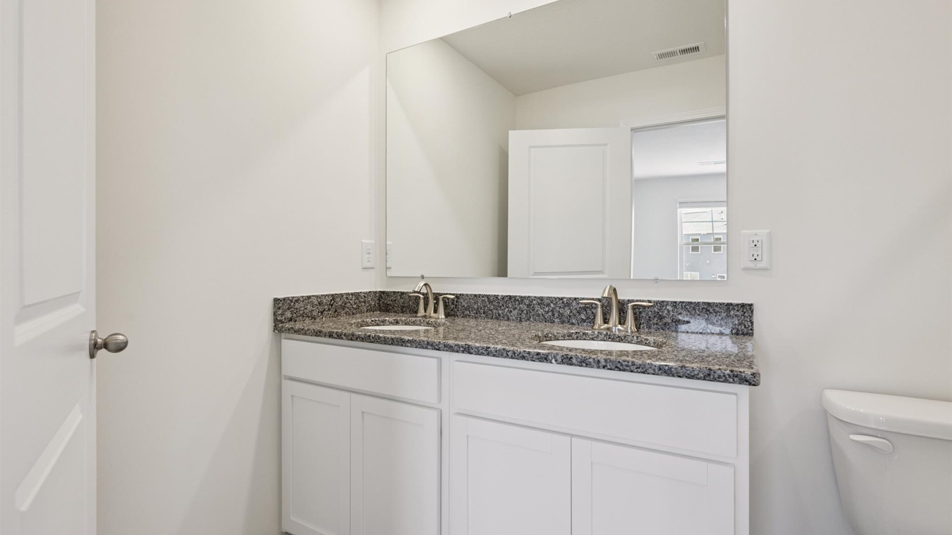 Owner’s ensuite in a new build home offers function and style with a walk-in closet, spa-like ensuite