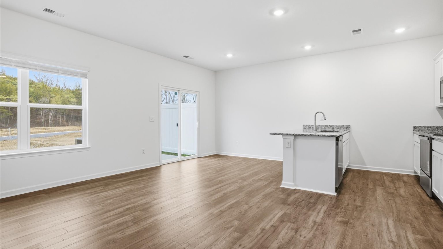 Open concept kitchen, living, and dining room space