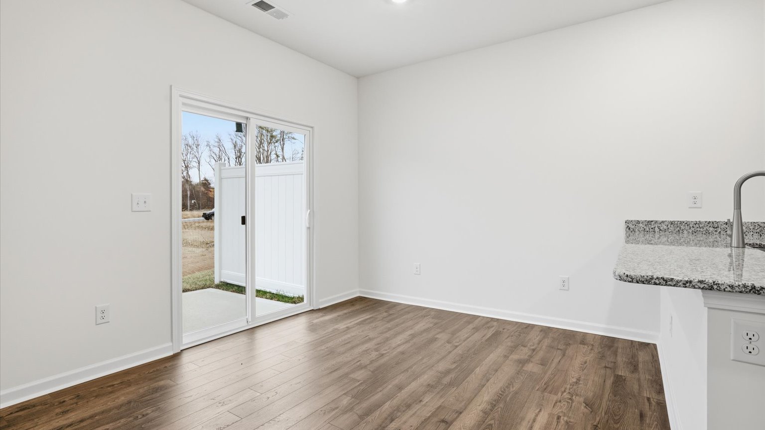 Open concept kitchen, living, and dining room space