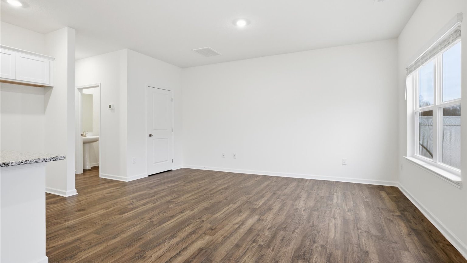 Open concept kitchen, living, and dining room space