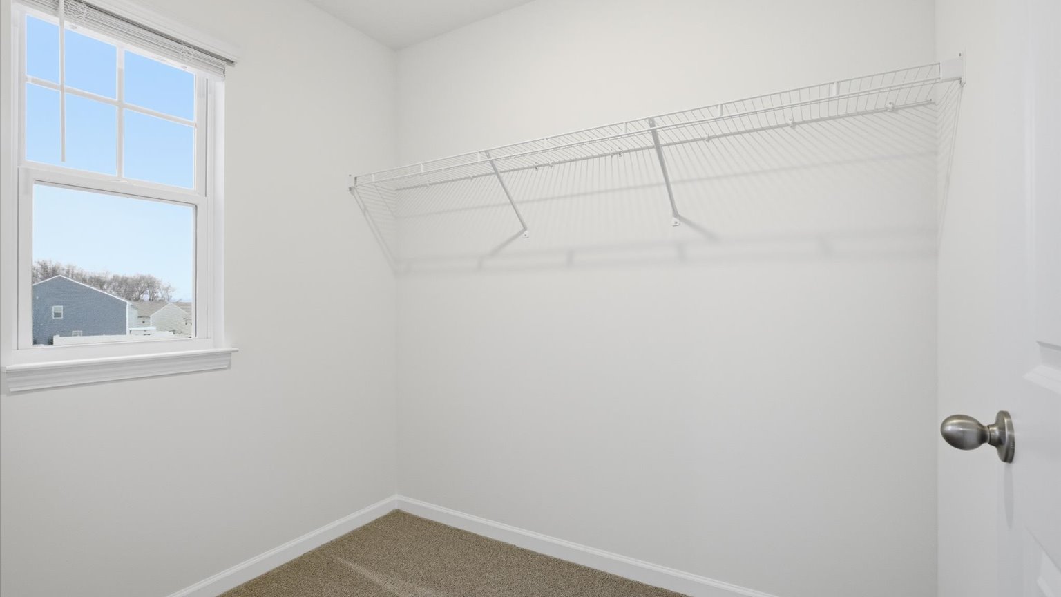Private primary walk-in closet