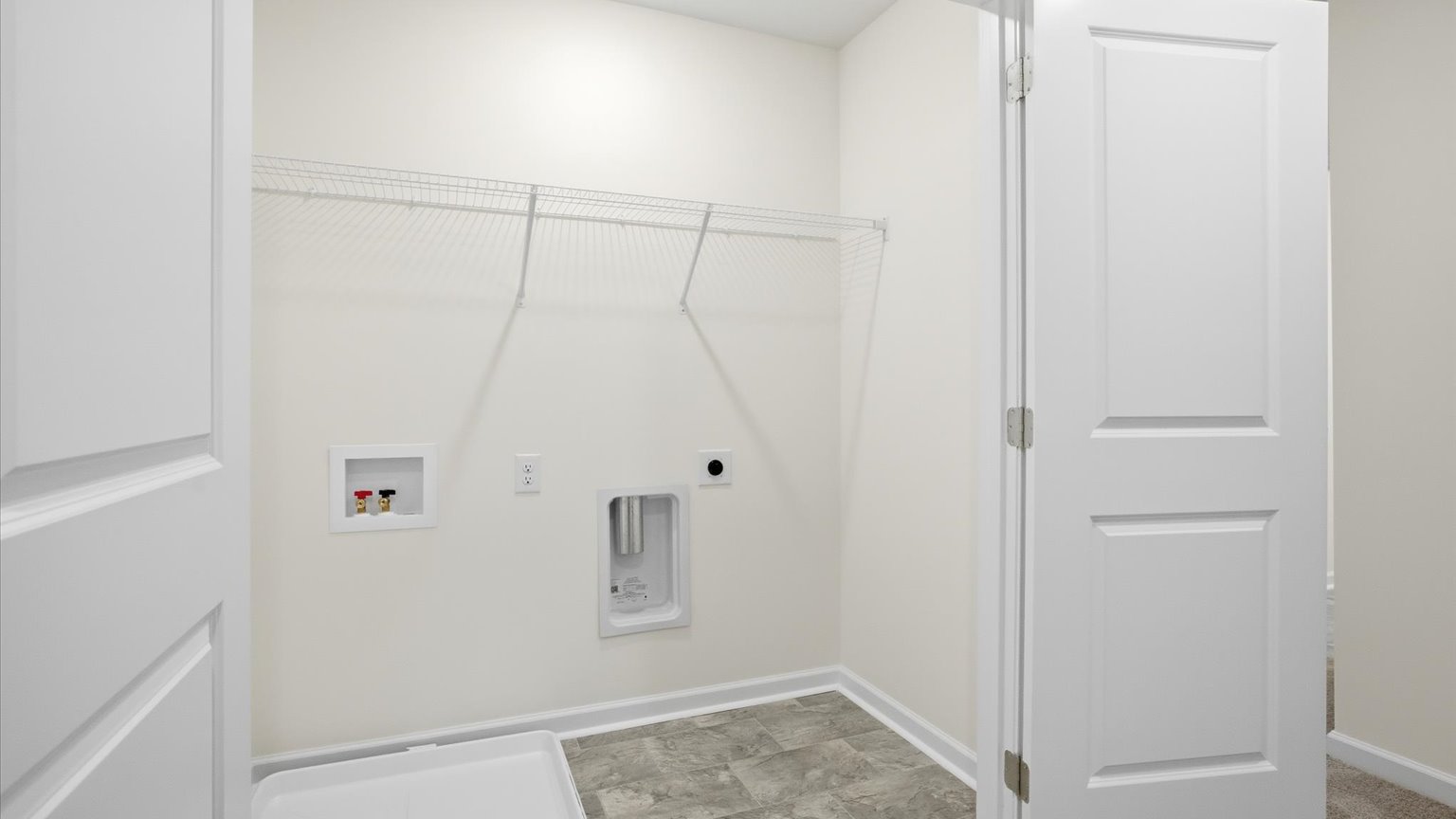 Laundry room with washer and dryer connections