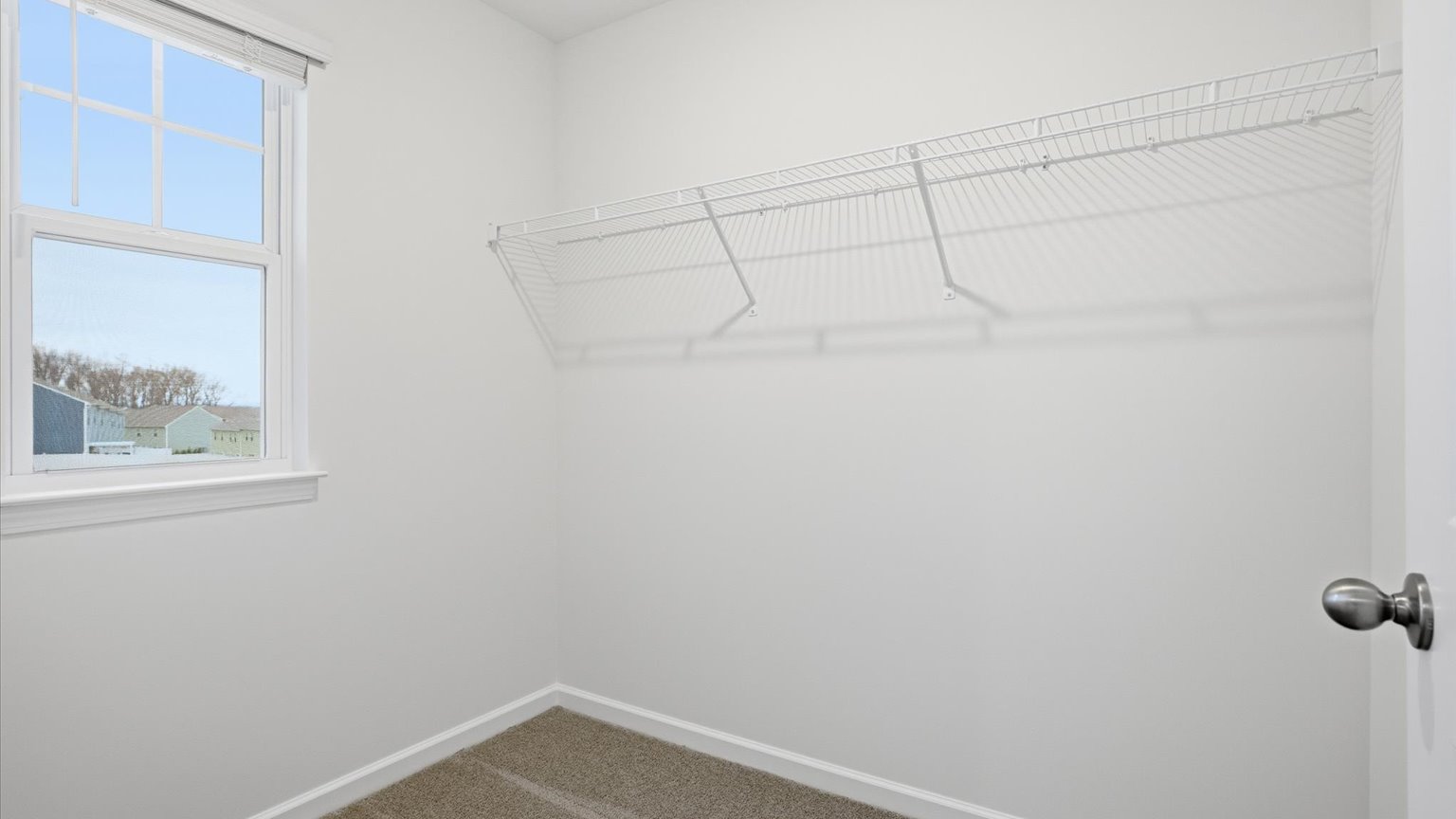 Private primary walk-in closet