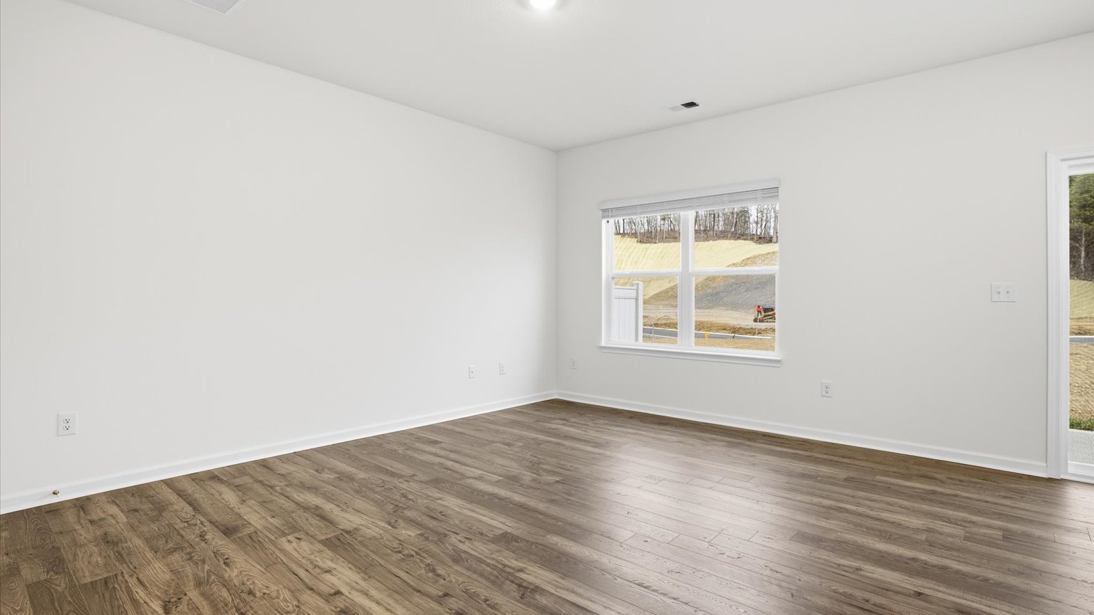 .Open concept kitchen, living, and dining room space