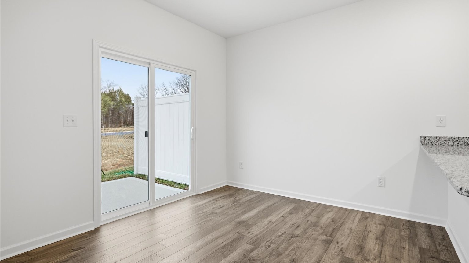 Open concept kitchen, living, and dining room space