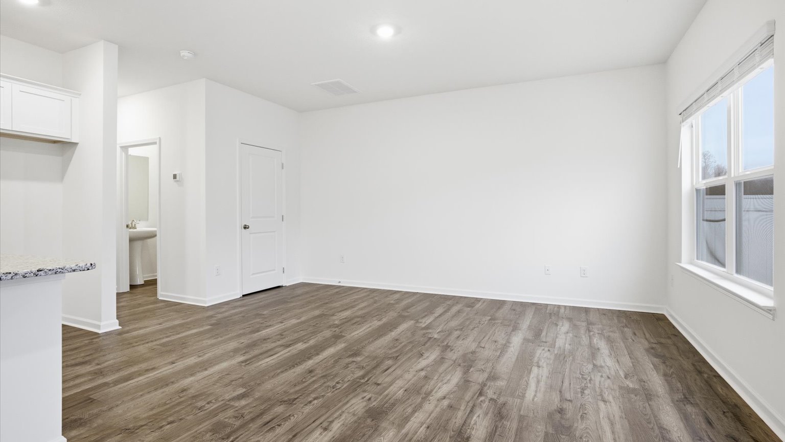 Open concept kitchen, living, and dining room space