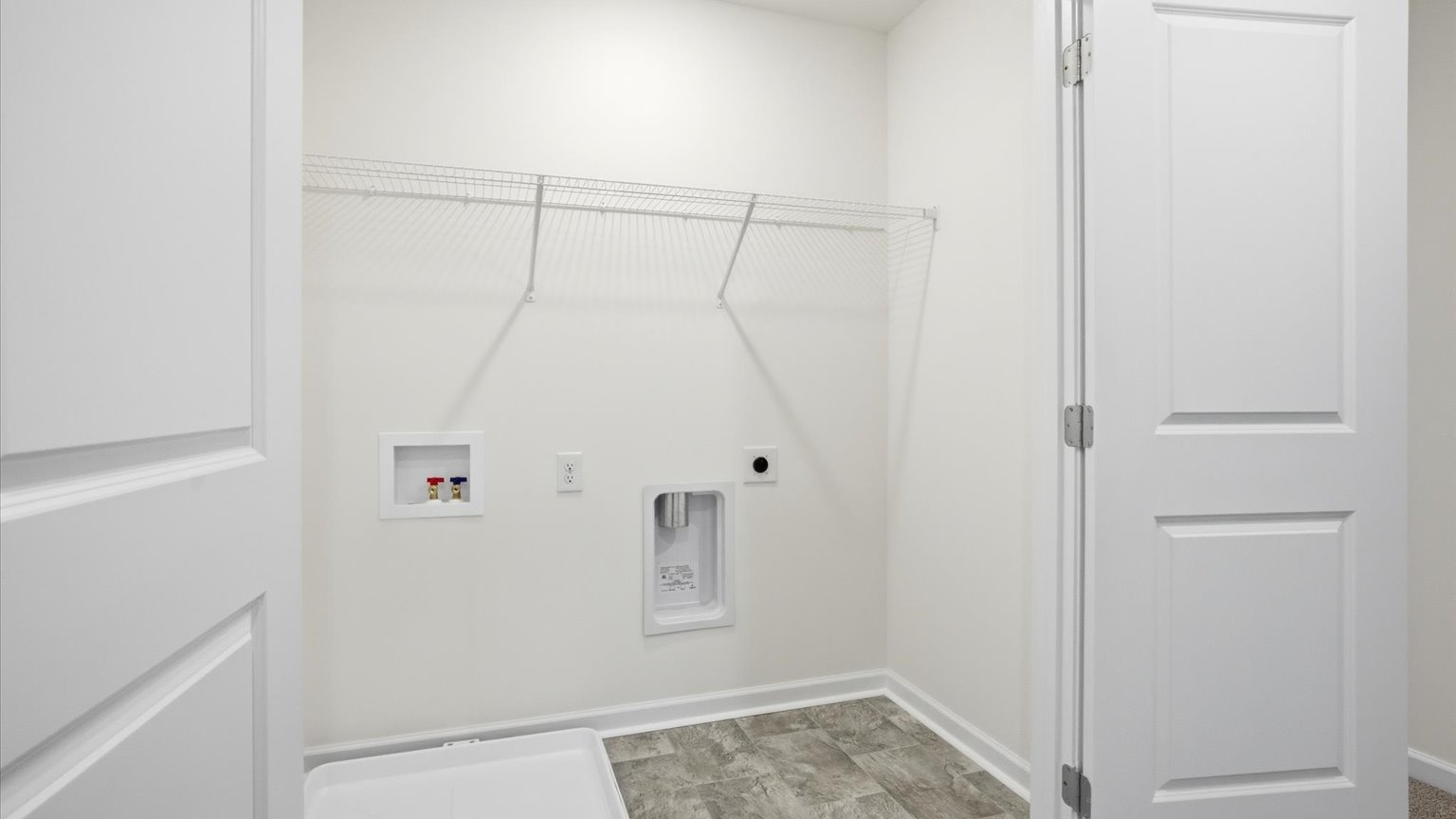 Laundry room with washer and dryer connections