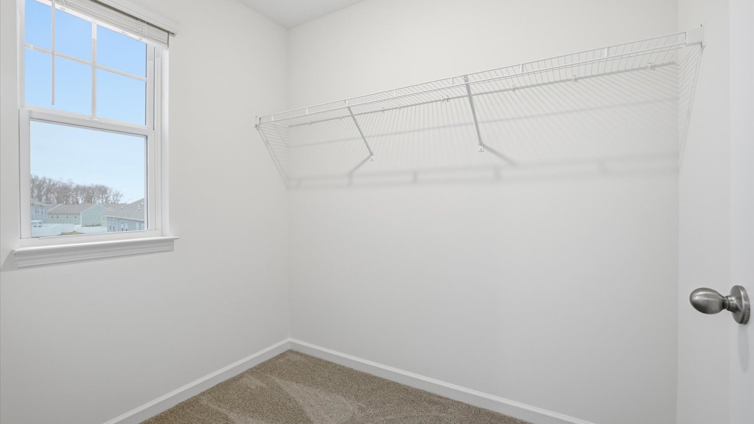 Private primary walk-in closet