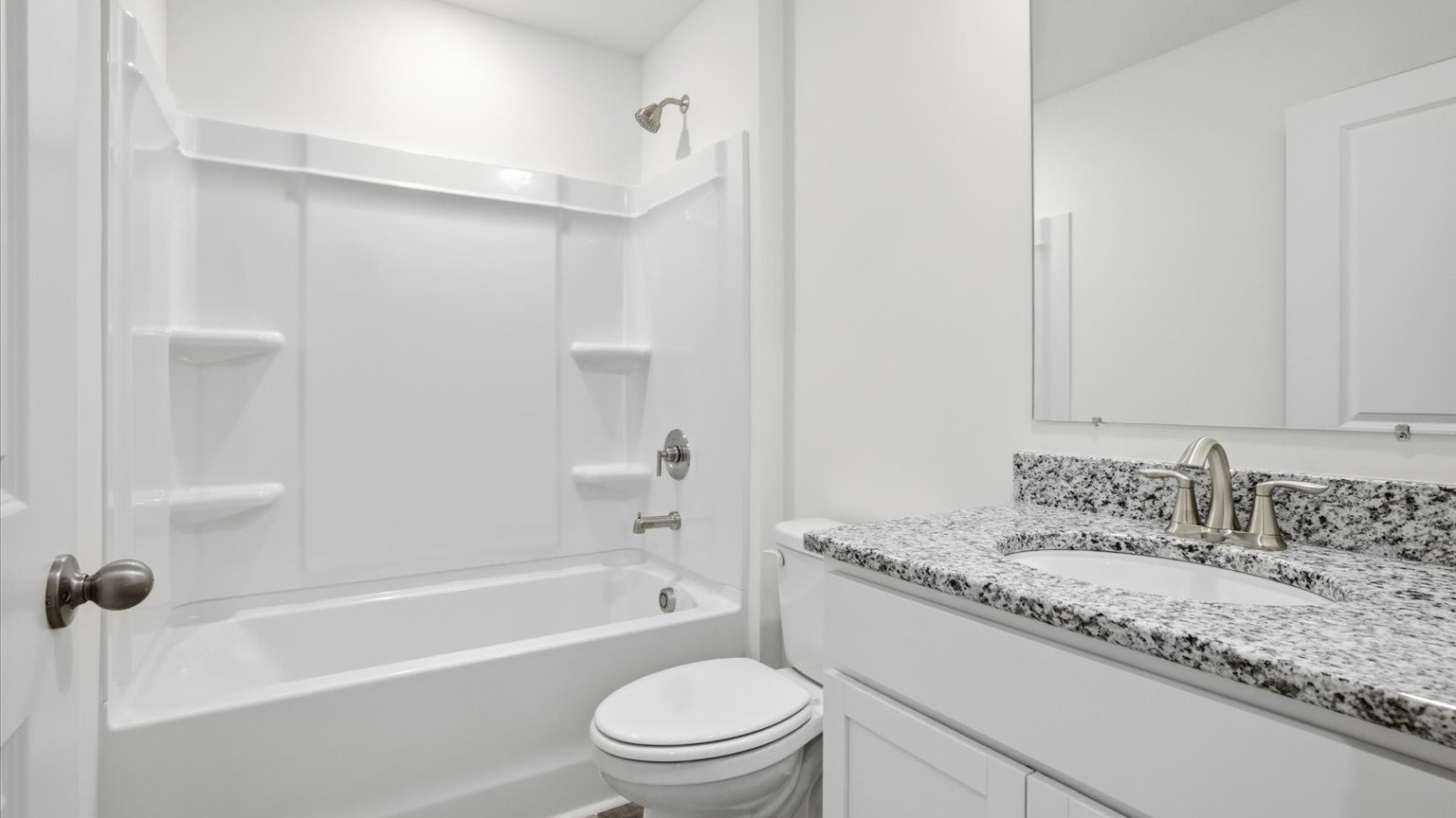 Bathroom with combination shower and bathtub