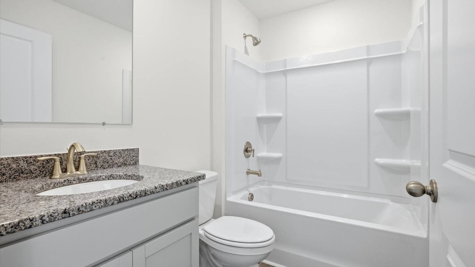 Bathroom with combination shower and bathtub