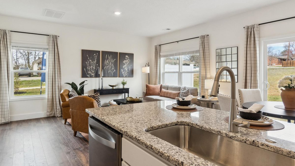 Open concept living, dining, and kitchen space