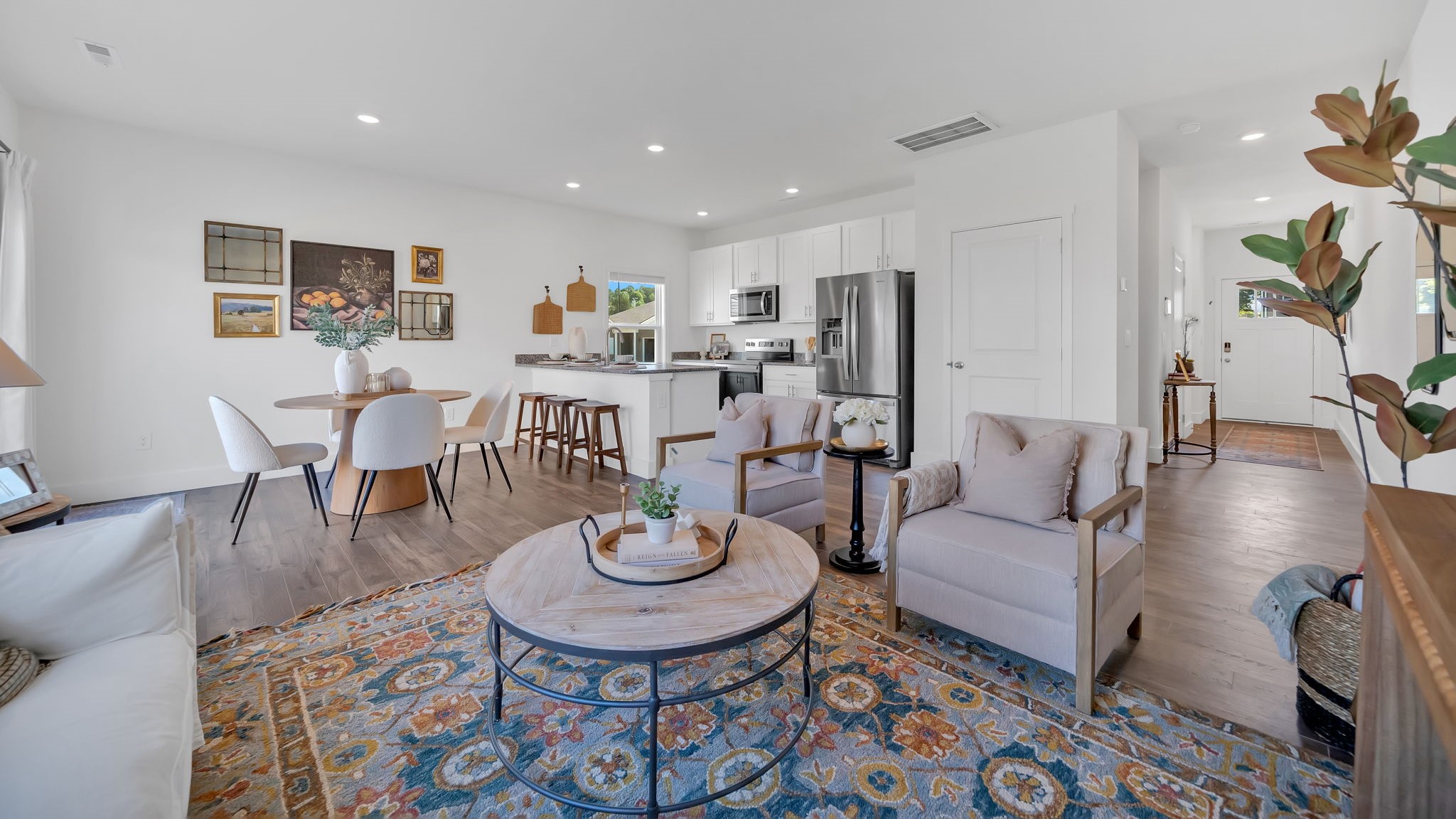 Open concept kitchen, living, and dining room space