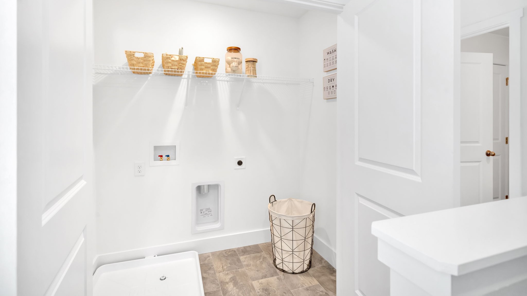 Laundry room with washer and dryer connections