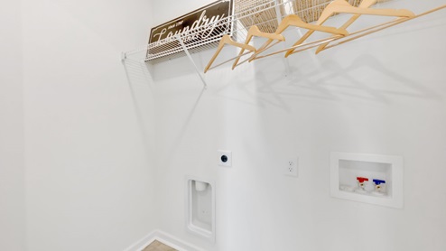 laundry room with wire shelves