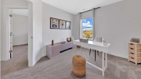 bedroom with white walls and carpet