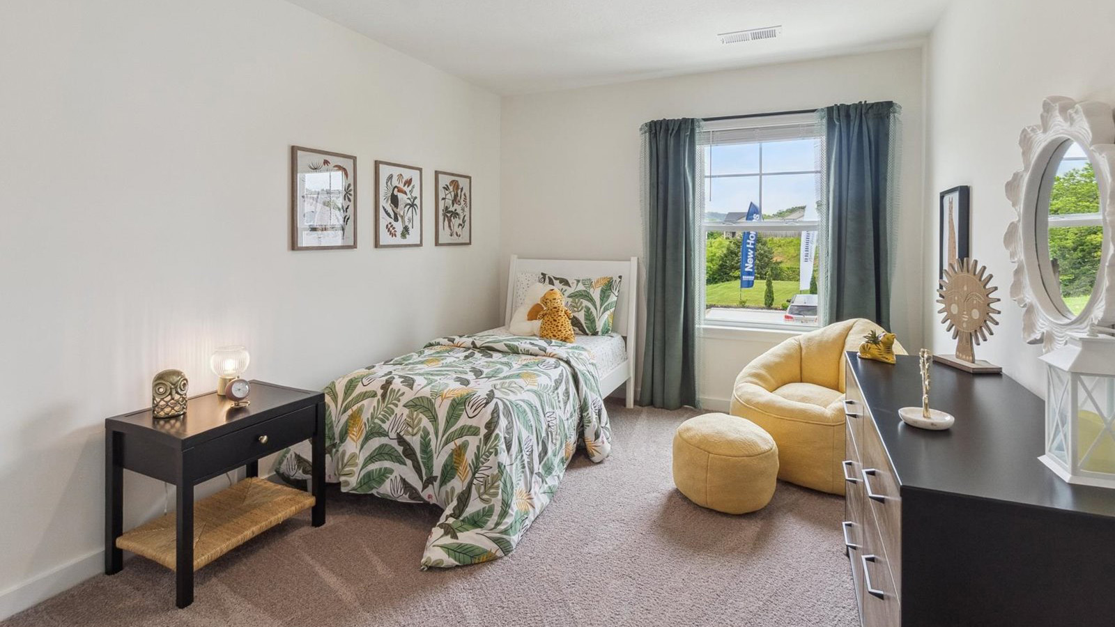 Bedroom with ample natural light and carpet floors