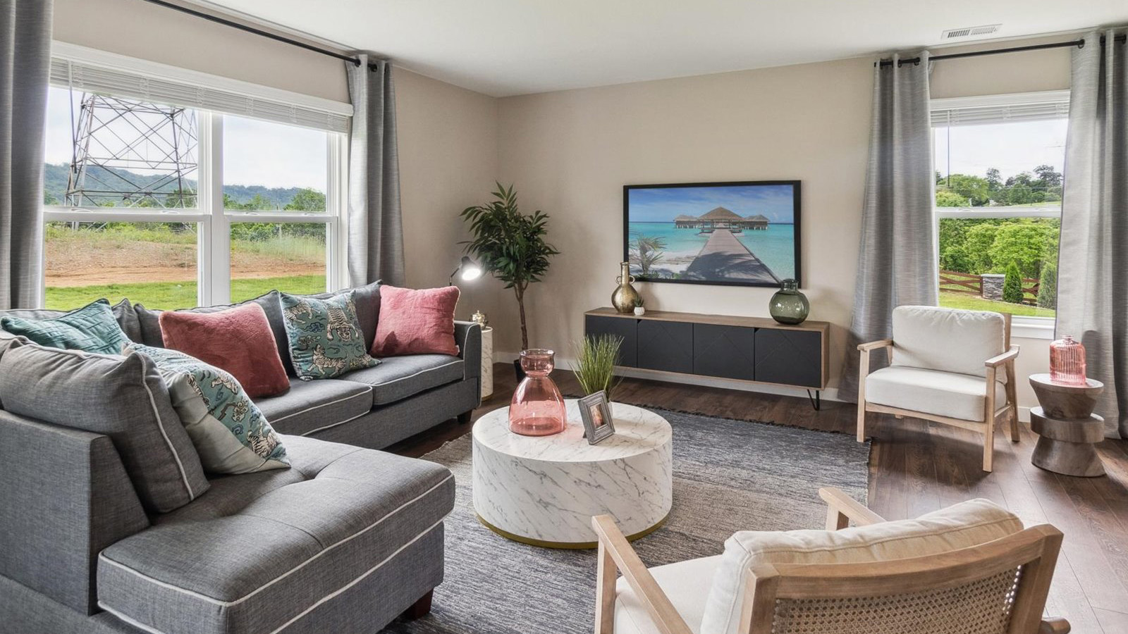 Open concept living, dining, and kitchen space