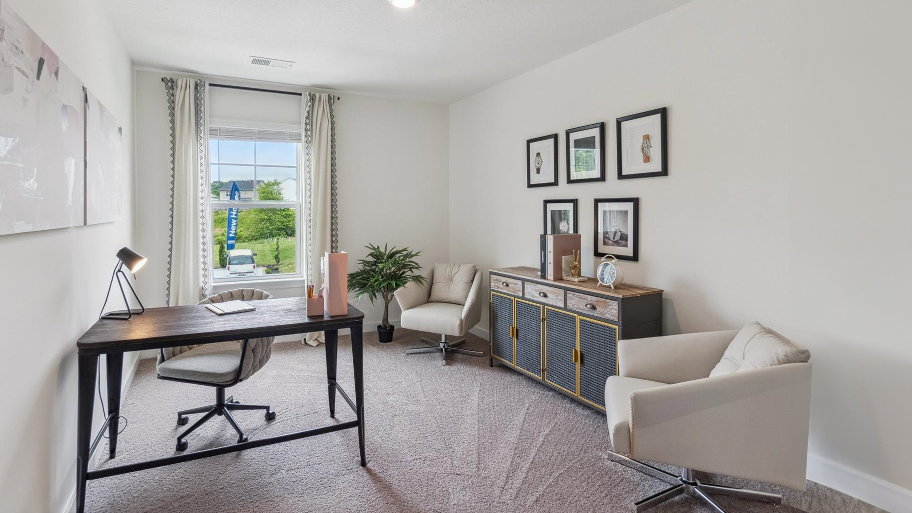Bedroom with ample natural light and carpet floors
