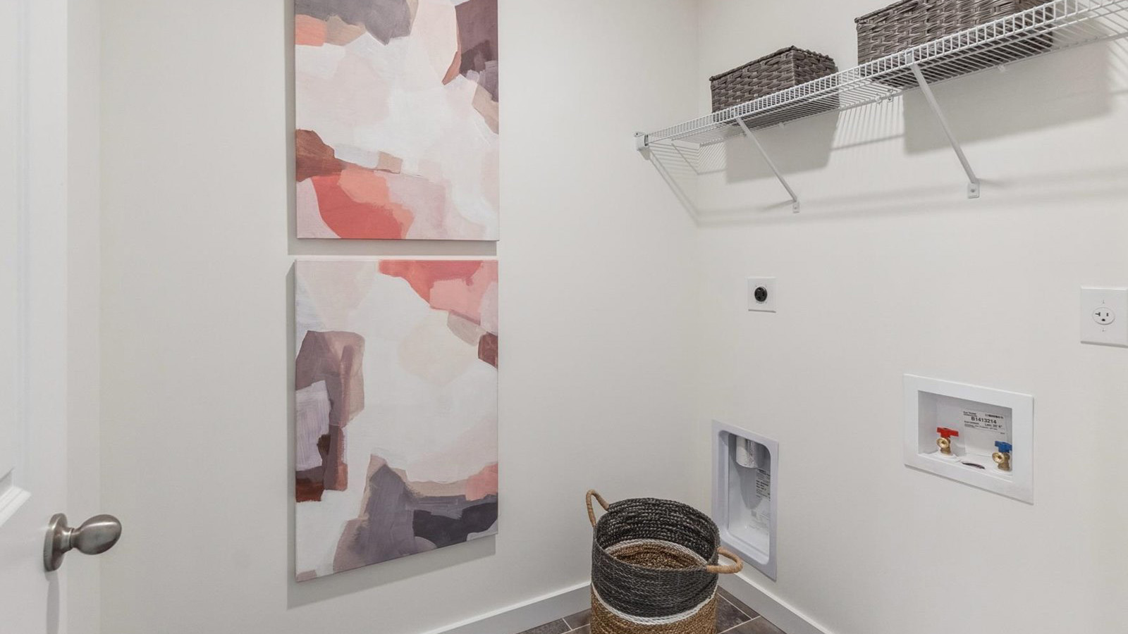 Laundry room and utility closet space with extra storage