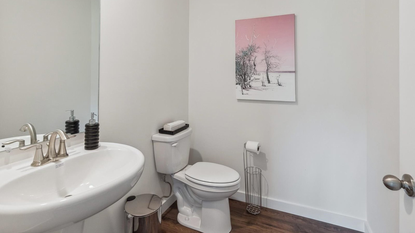 Half bathroom between common spaces