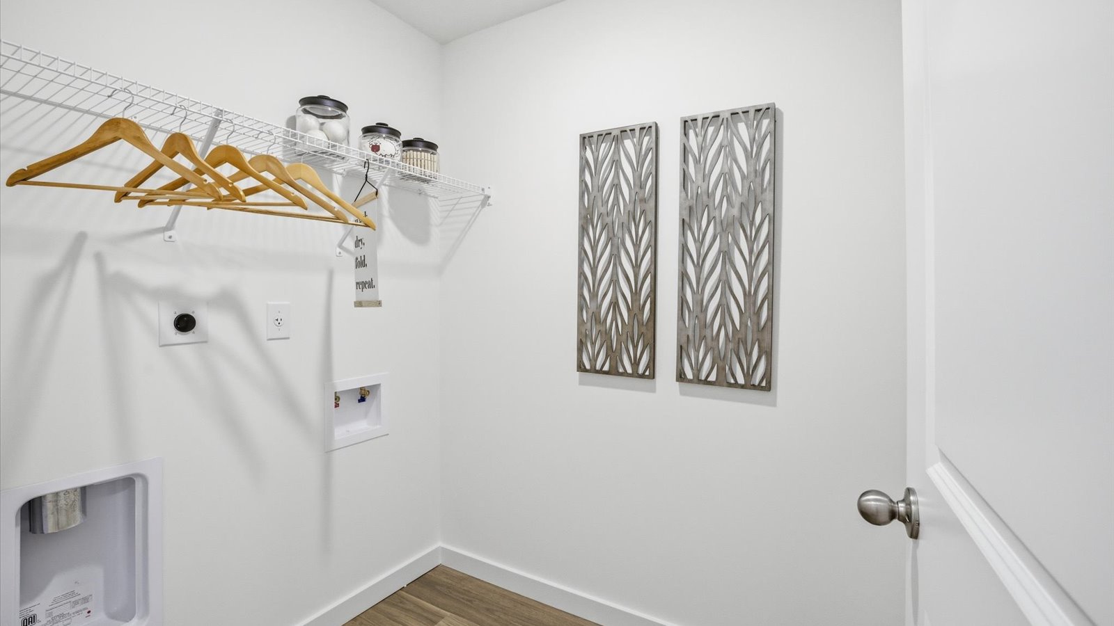 large walk in closet with shelving