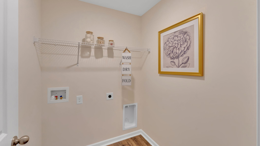 Laundry room and utility closet space with extra storage