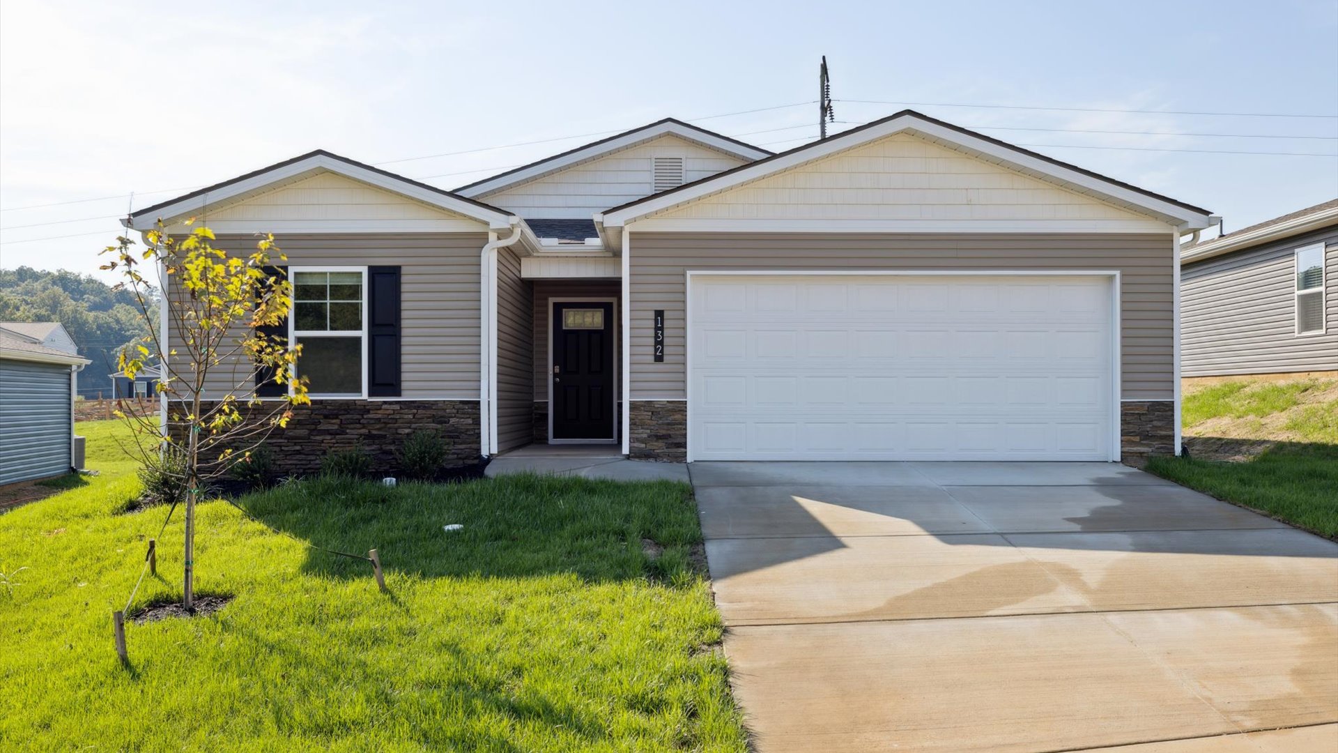 Exterior rendering of single story ranch home with vinyl, shake, and stone
