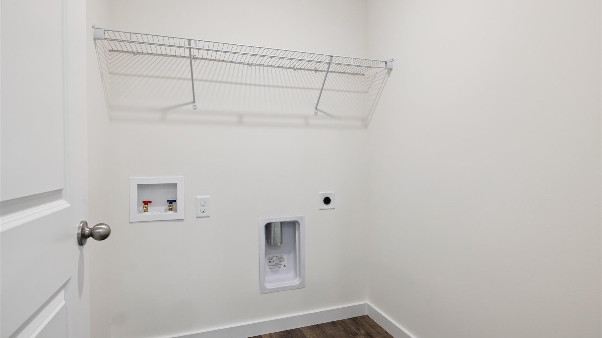 Emory Creek utility laundry smartly designed with overhead organized storage, a drop zone, with new washer, dryer included