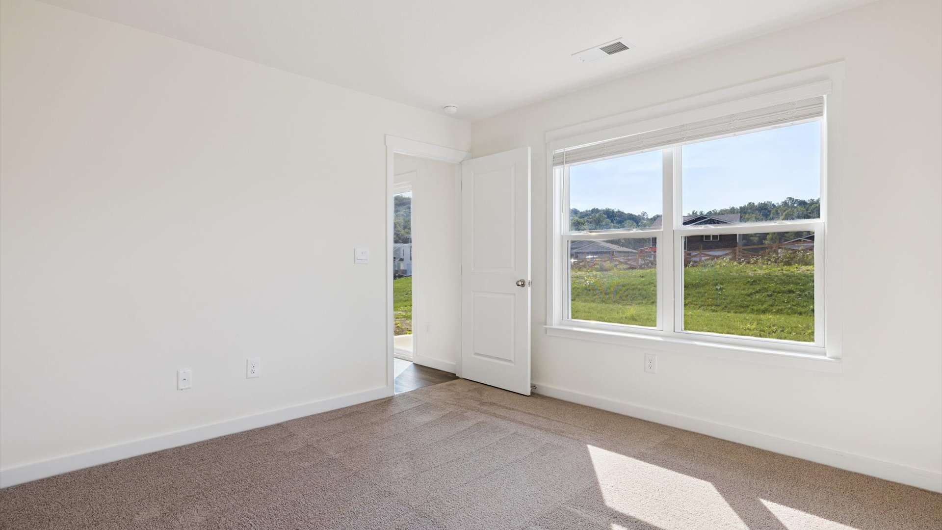 Multi-use bedroom, flex, office, study, craft, entertainment game room in this D.R. Horton new construction home