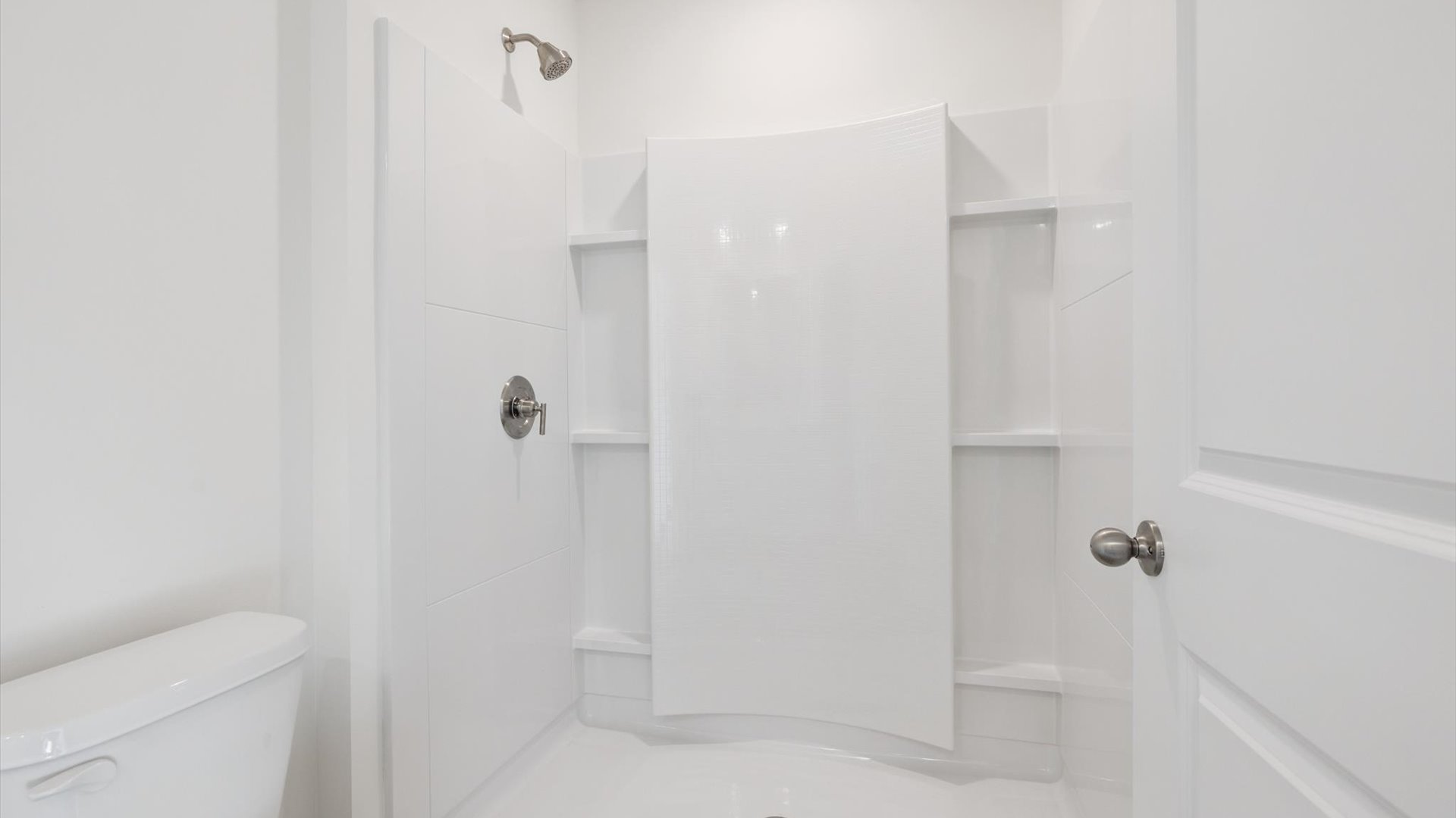 Secondary bath with built-in tub-shower combo, vanity, sink, lighting, stylish finishes in Emory Creek