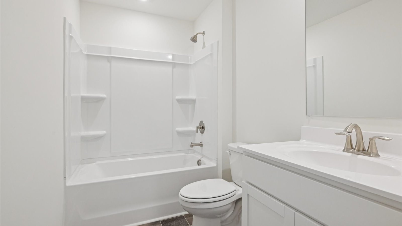 Bathroom with combination shower and bathtub