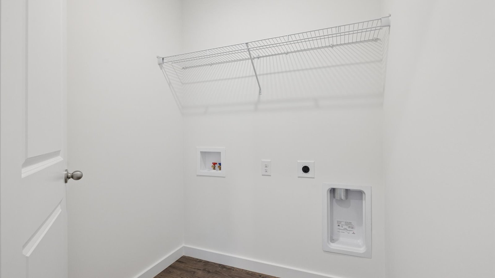 Laundry room and utility closet space with extra storage