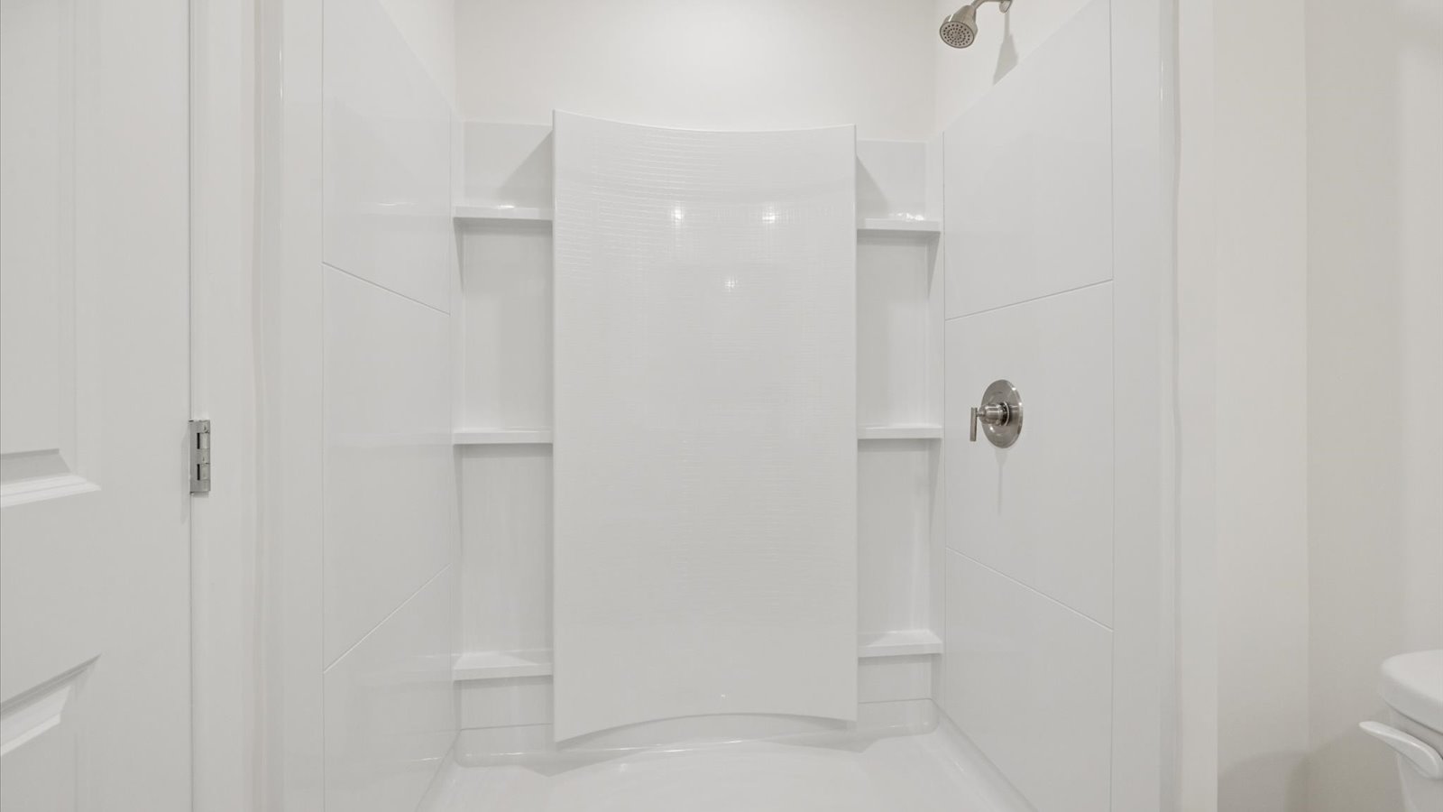 Primary bathroom with double vanity and walk-in shower