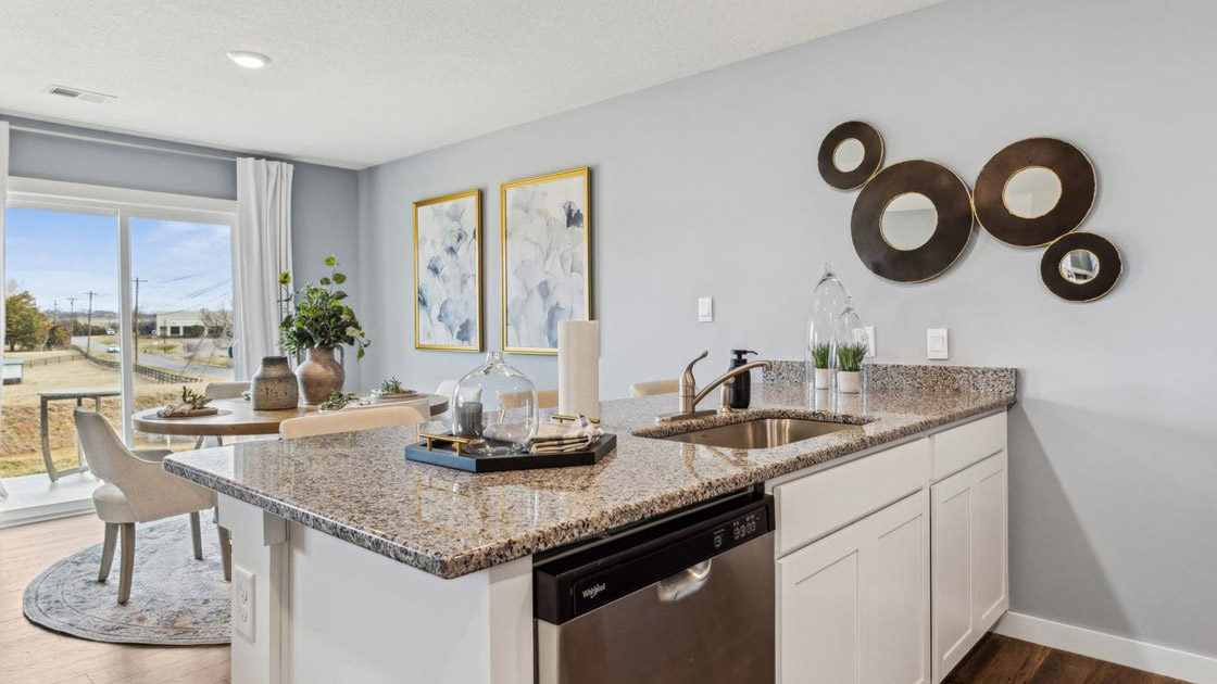 Open concept living, dining, and kitchen space