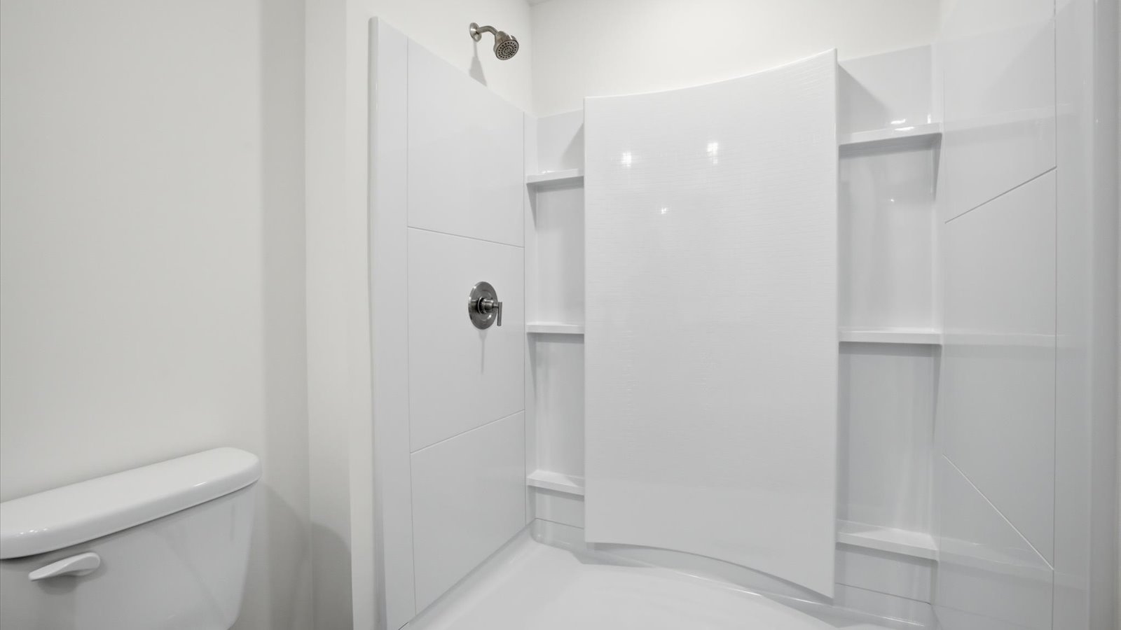 walk in shower with built in shelves