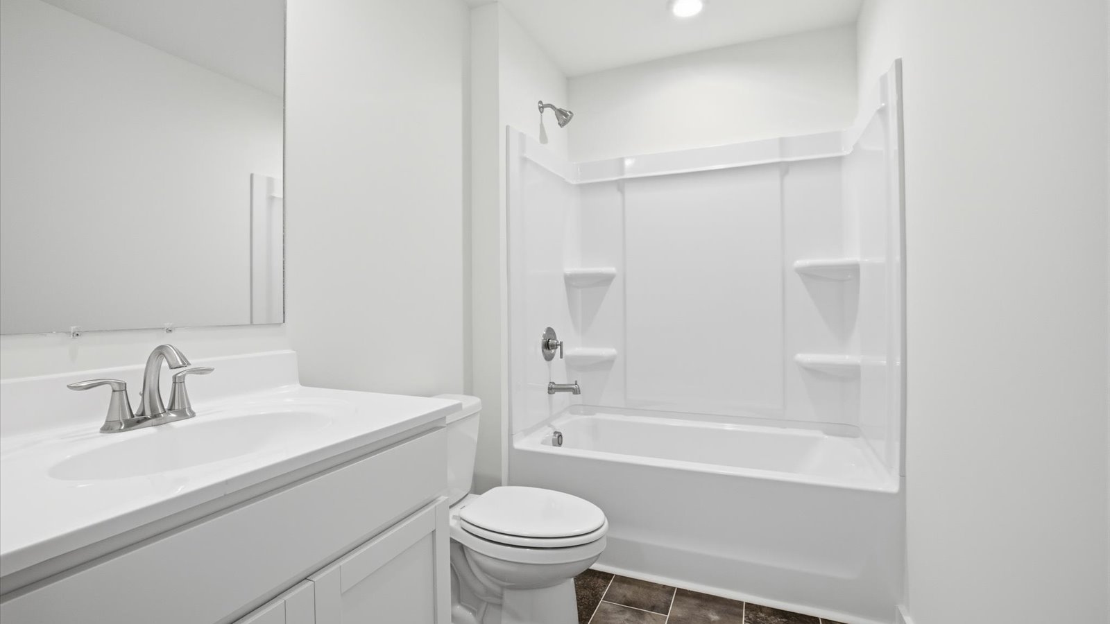 full bathroom with single vanity and combo bath tub and shower