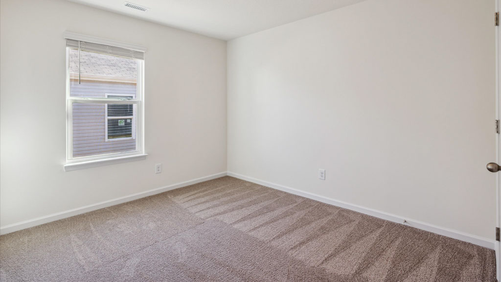 Primary bedroom designed with privacy and space in mind with a flow into a spa-inspired ensuite bathroom and walk-in closet