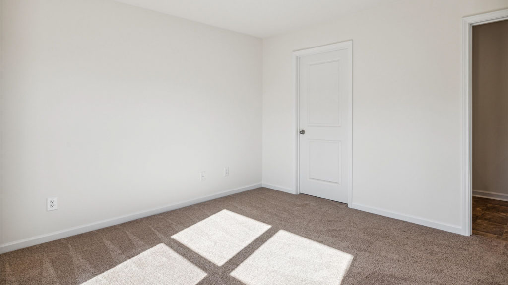 Primary bedroom designed with privacy and space in mind, a flow into a spa-inspired ensuite, walk-in closet on main level