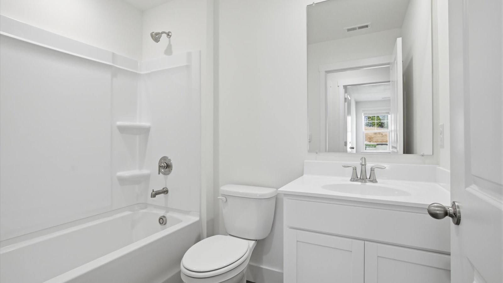 full bathroom with single bowl vanity and combo bathtub shower