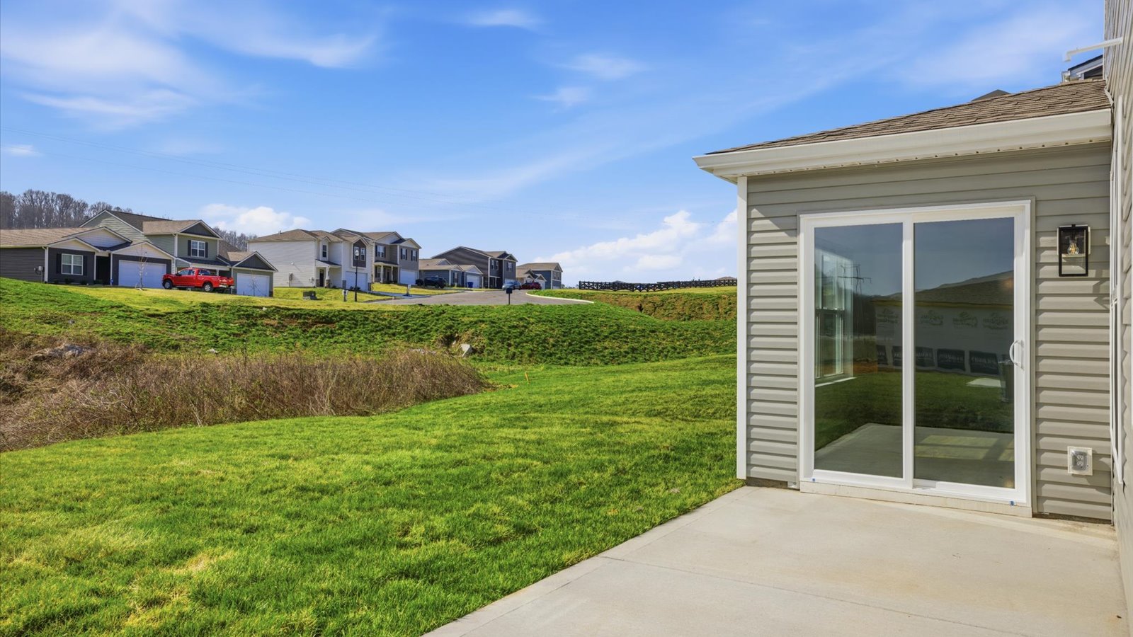 patio and sodded back yard