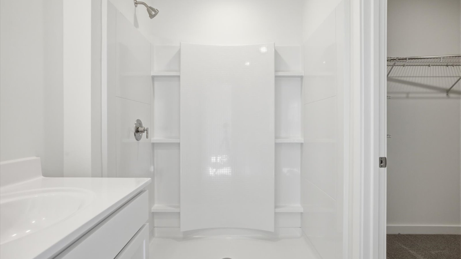 walk in shower with built in shelves
