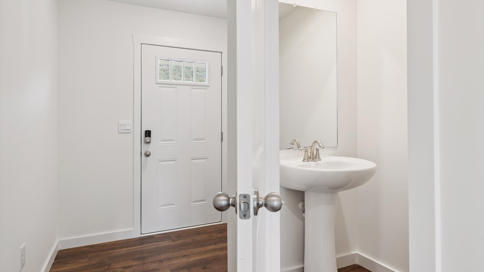 BathrooFront guest bedroom with ample natural light					m