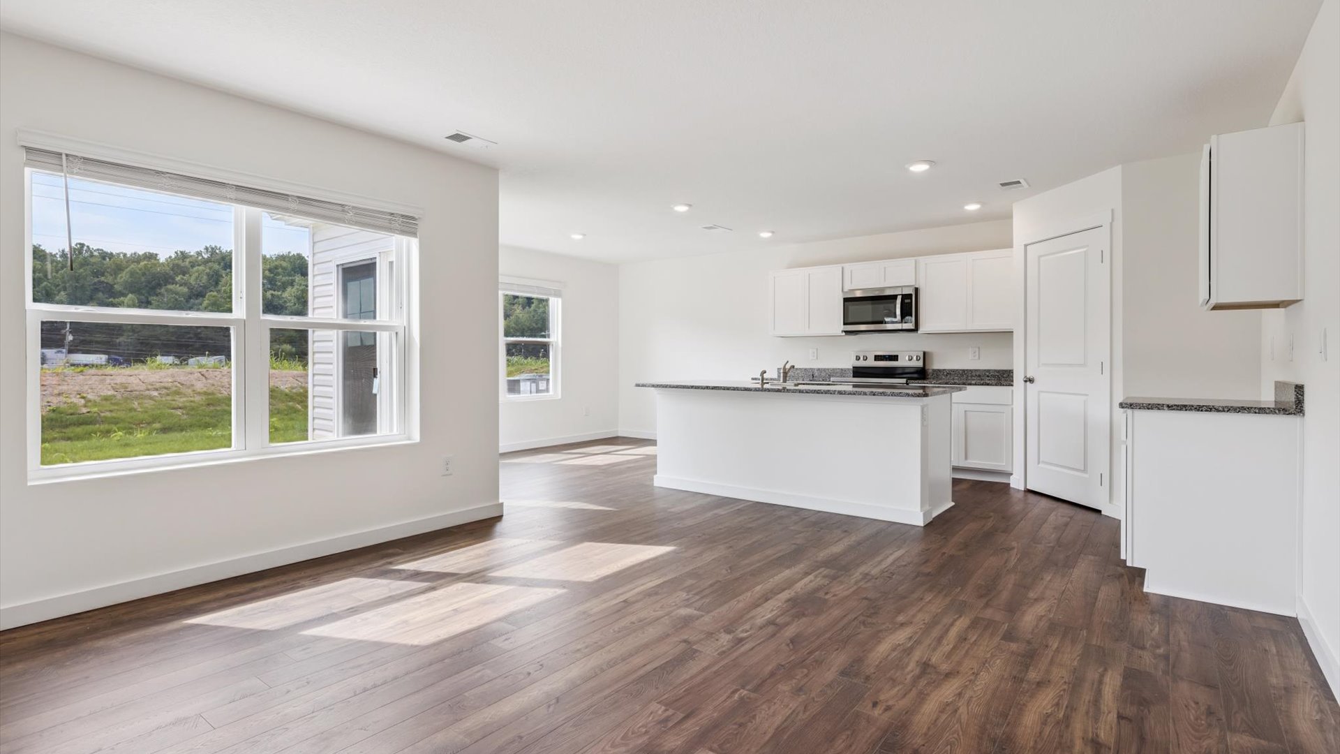 Spacious open kitchen overlooking  living space