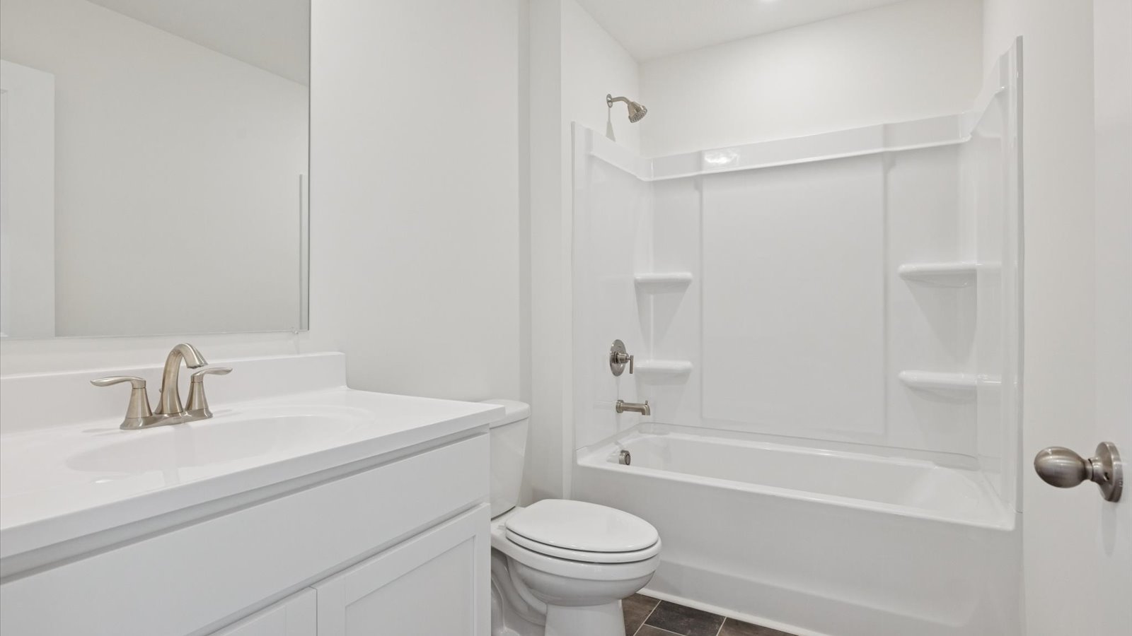 Bathroom with combination shower and bathtub