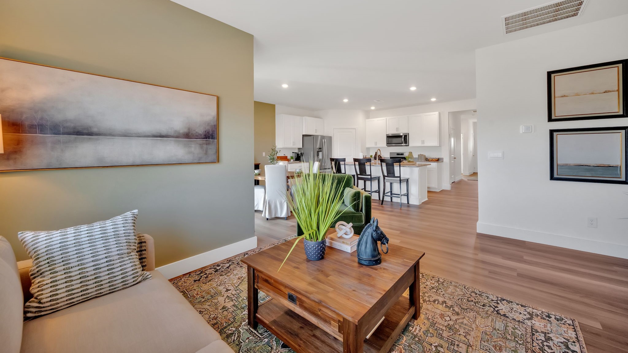 Open concept kitchen, living, family, and dining room space